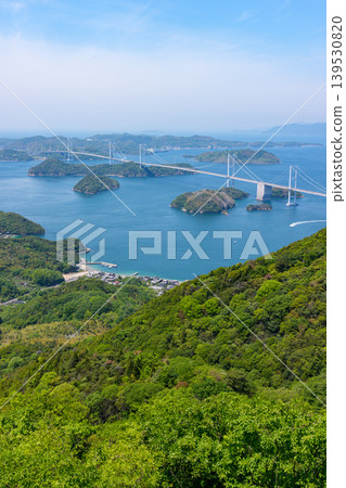 A spectacular view of the Kurushima Kaikyo Bridge and the islands of the Seto Inland Sea from Kirosan Observation Park, part of the Shimanami Kaido, Imabari City, Ehime Prefecture. 139530820