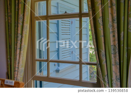Curtains and windows inside the former Hassam Residence (Important Cultural Property) in Sorakuen Garden, Kobe City. Curtains and windows inside the former Hassam Residence (Important Cultural Property) in Sorakuen Garden, Kobe City. 139530858