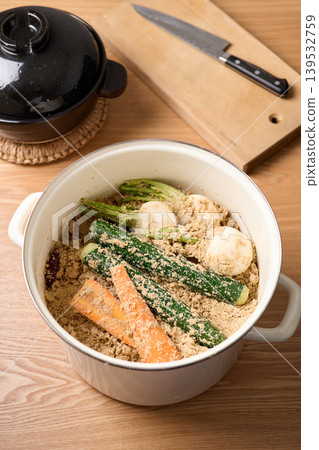 Pickled vegetables in enamel containers Pickled vegetables in enamel containers 139532759