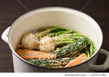 Pickled vegetables in enamel containers Pickled vegetables in enamel containers 139532765