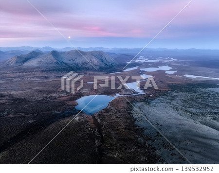 Arctic tundra landscape with moon and winding river Arctic tundra landscape with moon and winding river 139532952