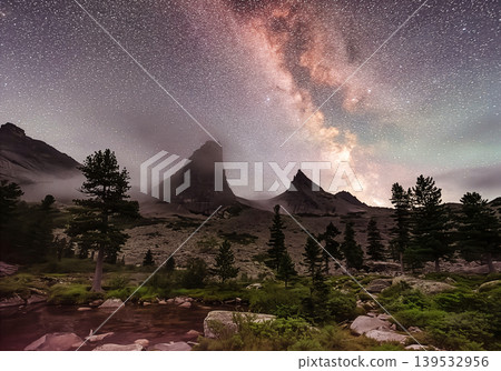 Milky Way arching over Ergaki Nature Park mountains at night 139532956