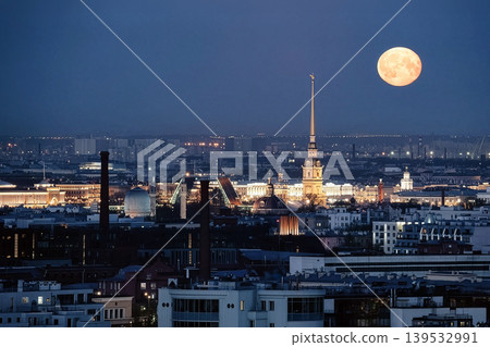 Peter and Paul Cathedral spire rising above St. Petersburg cityscape at night Peter and Paul Cathedral spire rising above St. Petersburg cityscape at night 139532991