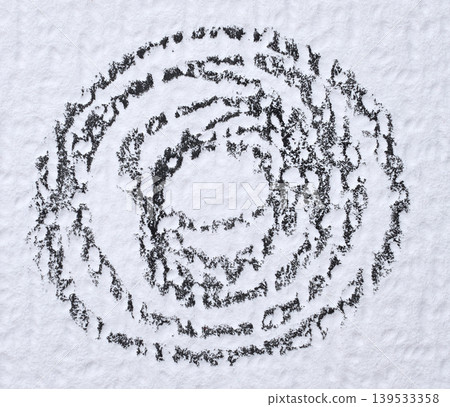 A black dashed circle drawn on a white sheet of paper A black dashed circle drawn on a white sheet of paper 139533358