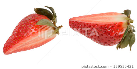 Halves of red ripe strawberries with green sepals on isolated background 139533421