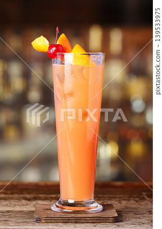 Cocktail on a blurry bar background Cocktail on a blurry bar background 139533975