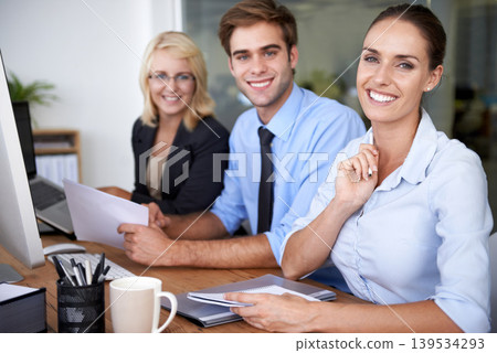 Portrait of happy business people at desk in coworking space with career in market research office. Team leader, professional employees and project manager with smile on face at planning workshop. Portrait of happy business people at desk in coworking space with career in market research office. Team leader, professional employees and project manager with smile on face at planning workshop. 139534293