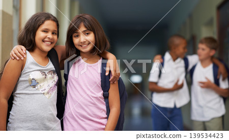 Girl, portrait and happy in corridor with friend or backpack for learning, education or knowledge at school. Student, person or face with smile in building or hallway before class or ready to study Girl, portrait and happy in corridor with friend or backpack for learning, education or knowledge at school. Student, person or face with smile in building or hallway before class or ready to study 139534423