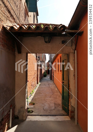 Murano, Italy, off the coast of Venice, an alley in the old town of Navajero Island. 139534432