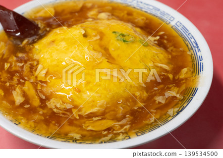 Delicious local Chinese restaurant's Tenshinhan (rice omelet with gravy) Delicious local Chinese restaurant's Tenshinhan (rice omelet with gravy) 139534500