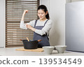 Image of a woman cooking, doing housework, and cooking for herself. 139534549