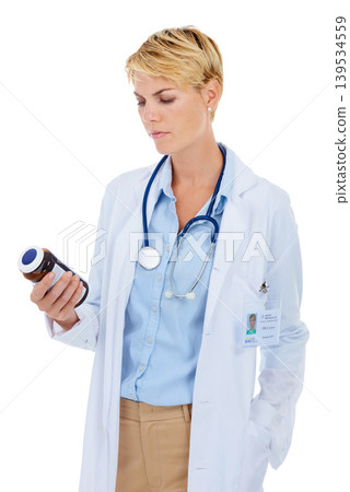 Doctor, medicine and thinking or confused in studio for healthcare compliance, reading information or label. Medical worker or pharmacist with pills bottle, analysis or question on a white background Doctor, medicine and thinking or confused in studio for healthcare compliance, reading information or label. Medical worker or pharmacist with pills bottle, analysis or question on a white background 139534559