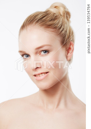 Portrait of happy model, smile or skincare for wellness with cosmetics, aesthetic or healthy glow. Dermatology, studio or confident woman with pride, smile or beauty results on white background Portrait of happy model, smile or skincare for wellness with cosmetics, aesthetic or healthy glow. Dermatology, studio or confident woman with pride, smile or beauty results on white background 139534764