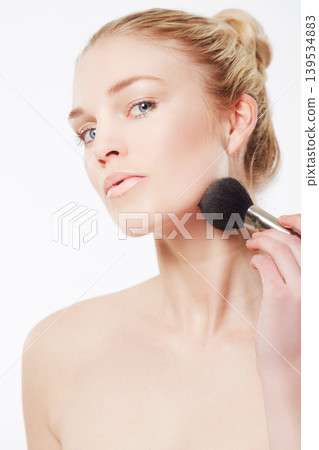 Makeup brush, portrait or model with skincare in studio for beauty or wellness on white background. Makeover, glamour or woman isolated with foundation powder, cosmetics or product for application Makeup brush, portrait or model with skincare in studio for beauty or wellness on white background. Makeover, glamour or woman isolated with foundation powder, cosmetics or product for application 139534883