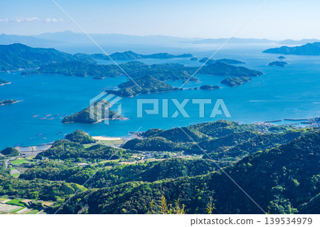 View from Mt. Kuratake, the highest peak in the Amakusa Islands, Kumamoto Prefecture. View from Mt. Kuratake, the highest peak in the Amakusa Islands, Kumamoto Prefecture. 139534979