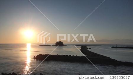 Himi Fishing Port and Karashima Island at sunrise Himi Fishing Port and Karashima Island at sunrise 139535037
