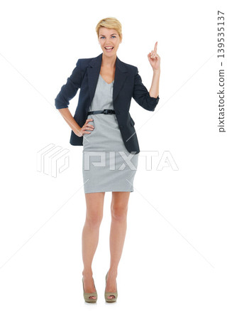 Business woman, portrait and pointing up in studio for advertising choice, decision and promotion on white background. Happy employee, presentation and announcement of feedback, news deal or solution Business woman, portrait and pointing up in studio for advertising choice, decision and promotion on white background. Happy employee, presentation and announcement of feedback, news deal or solution 139535137
