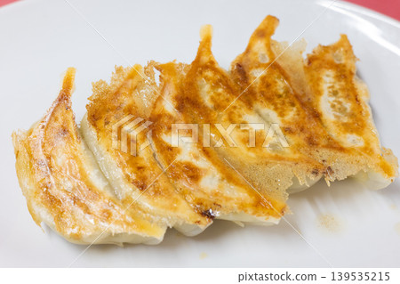 Delicious pan-fried dumplings from a local Chinese restaurant 139535215