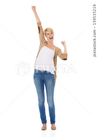 Happy woman, portrait and fist pump in celebration for good news or winning on a white studio background. Young female person, model or blonde smile for achievement, promotion or deal on mockup space Happy woman, portrait and fist pump in celebration for good news or winning on a white studio background. Young female person, model or blonde smile for achievement, promotion or deal on mockup space 139535219