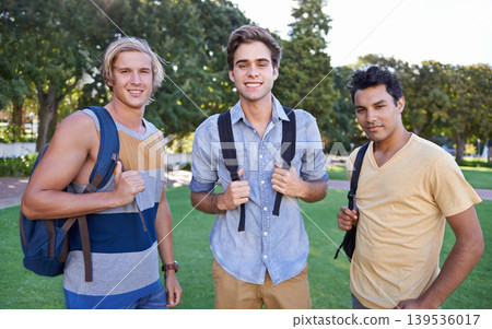 Men, portrait or friends in park at college, campus or together with happiness, smile or group. University, academy or students bond with support, joy or solidarity in education in garden together 139536017
