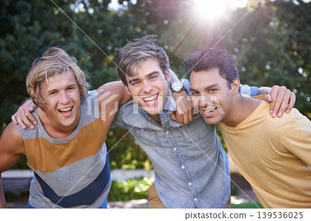 College, portrait and friends in the park at campus or support together with happiness. University, academy or group bonding in community with solidarity in education or hug in garden after class College, portrait and friends in the park at campus or support together with happiness. University, academy or group bonding in community with solidarity in education or hug in garden after class 139536025