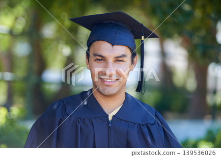 Graduation, portrait and man with smile to celebrate success, education and college scholarship outdoor. Happy university graduate, certified student and pride for achievement of award for knowledge Graduation, portrait and man with smile to celebrate success, education and college scholarship outdoor. Happy university graduate, certified student and pride for achievement of award for knowledge 139536026