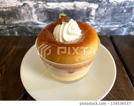 Chestnut cream savarin decorated with chestnuts and gold leaf Chestnut cream savarin decorated with chestnuts and gold leaf 139536537