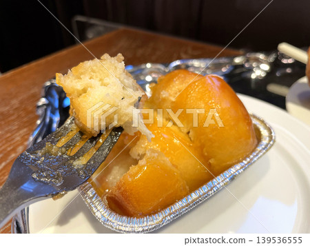 Rum-soaked brioche Rum-soaked brioche 139536555