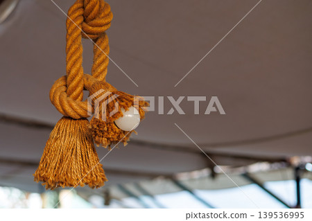 Decorative braided rope light fixture with tassels Decorative braided rope light fixture with tassels 139536995