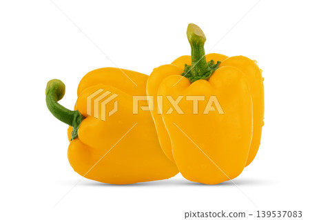 Two fresh yellow bell peppers on white background with clipping path 139537083