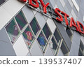 Jerseys reflected in the diamond-shaped windows of the rugby stadium 139537407