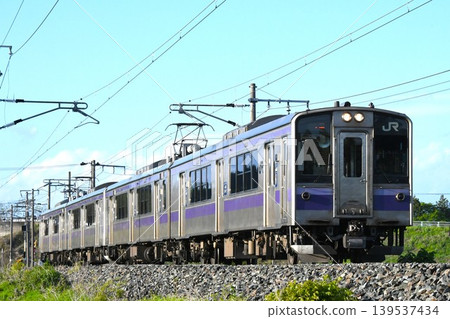A 701 series train traveling on the Tohoku Main Line towards Ichinoseki. 139537434