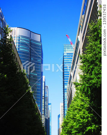 A view of the cluster of skyscrapers in the Marunouchi area of Tokyo Station. A view of the cluster of skyscrapers in the Marunouchi area of Tokyo Station. 139537458