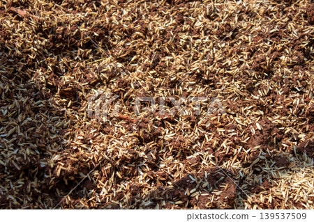 Layer of red soil and husks to improve drainage for pots. Layer of red soil and husks to improve drainage for pots. 139537509