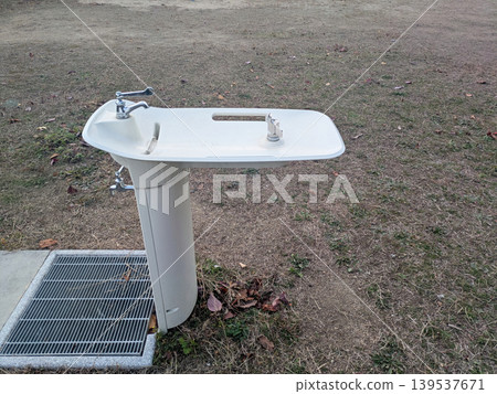 Universally designed drinking fountain installed in the park square Universally designed drinking fountain installed in the park square 139537671
