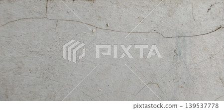 Cracked gray concrete walls with a minimalist rough texture. 139537778