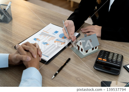 Young business woman is talking about presenting real estate Young business woman is talking about presenting real estate 139537794