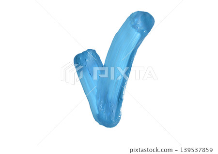 A stroke of blue acrylic paint in the shape of a check mark. A stroke of blue acrylic paint in the shape of a check mark. 139537859