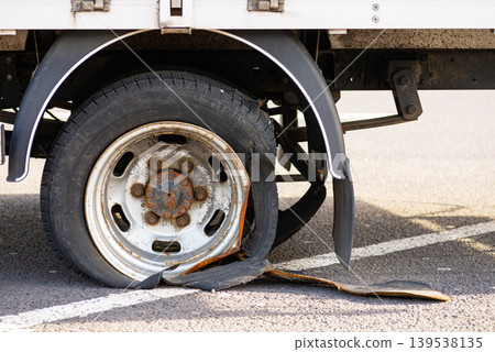 Flat tire on truck wheel during road trip 139538135