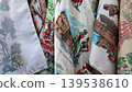 Printed souvenir scarves with spanish landmarks and flamenco motifs for travel souvenir display and textile pattern design background. Feria La Vaquilla, Colmenar Viejo, Spain 139538610