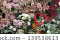 Assorted pink and red roses bouquet with heart decoration for romantic floral background and valentines banner design 139538613