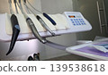 Closeup view of dental handpieces and control panel on a delivery tray for clinic equipment catalog background and banner design 139538618