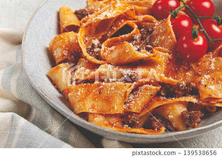 pappardelle pasta with bolognese sauce, topped with parmesan cheese and cherry branch, homemade, no people, pappardelle pasta with bolognese sauce, topped with parmesan cheese and cherry branch, homemade, no people, 139538656