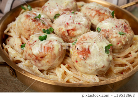 spaghetti with chicken meatballs, with cream sauce, and parmesan cheese, and decorated with microgreens, homemade, no people, spaghetti with chicken meatballs, with cream sauce, and parmesan cheese, and decorated with microgreens, homemade, no people, 139538668