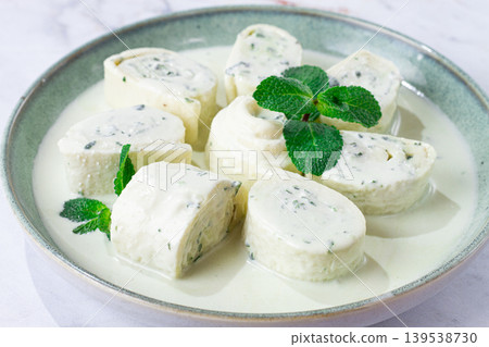 Gebjalia, Megrelian dish, cold appetizer of cheese with mint, Georgian traditional cuisine, homemade. 139538730