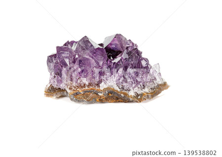 Amethyst Crystal Druse macro mineral on white background Amethyst Crystal Druse macro mineral on white background 139538802