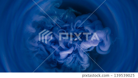 Blur paint twirl. Color water. Defocused blue circle sparkling texture glitter fog liquid spreading on abstract dark black background. Blur paint twirl. Color water. Defocused blue circle sparkling texture glitter fog liquid spreading on abstract dark black background. 139539025