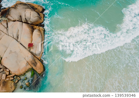Coastline with rocks on beach and ocean in Brazil. Drone view Coastline with rocks on beach and ocean in Brazil. Drone view 139539346