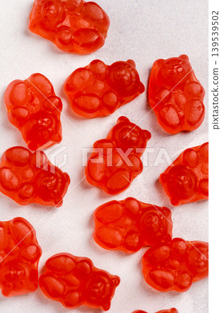 Jelly gummy bear fruit vitamins on bright background, food supplements.Vitamins candies Jelly gummy bear fruit vitamins on bright background, food supplements.Vitamins candies 139539502