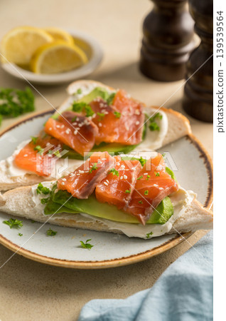 Salmon toast with avocado and cream cheese, breakfast, healthy food Salmon toast with avocado and cream cheese, breakfast, healthy food 139539564